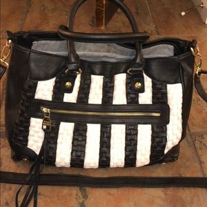 a large Steve Madden black and white purse